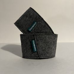 Two Starbucks Reuasable Sleeves 