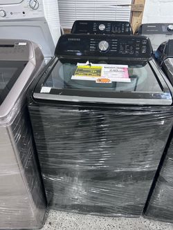 BRAND  NEW SAMSUNG WASHER.