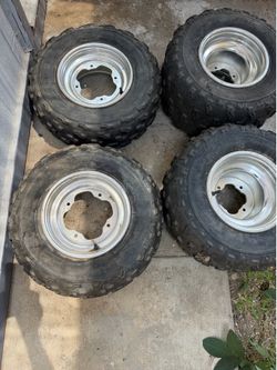 Yamaha Raptor rim & tires $150