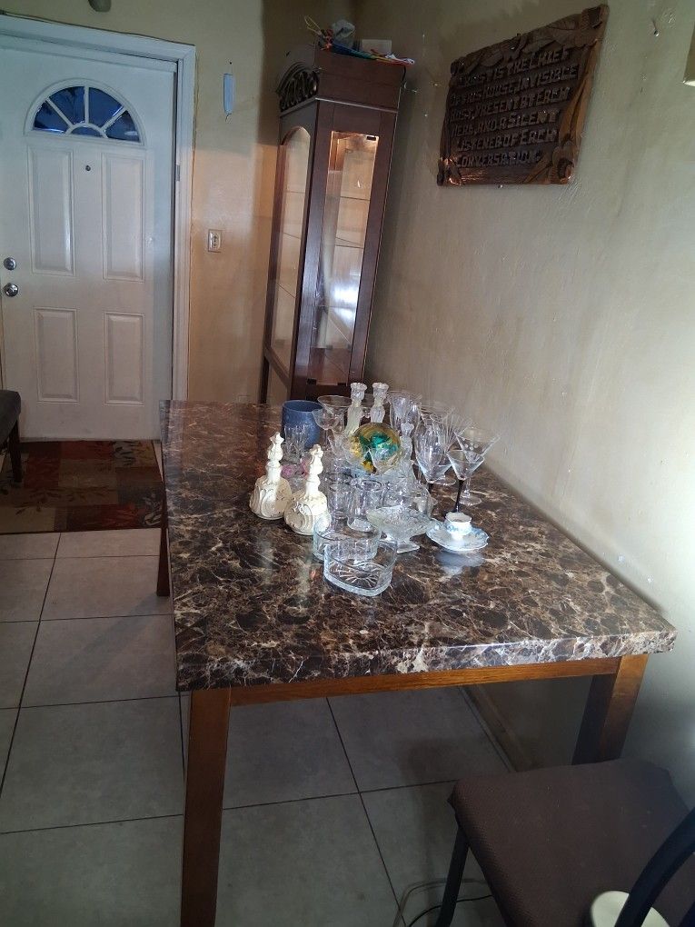 Table With Glass No Chairs Curio With Light.