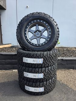 18" LOCK OLYMPUS rims w/ 32" BfGoodrich KO3 tires
