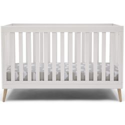 White Crib with Natural Wood Legs