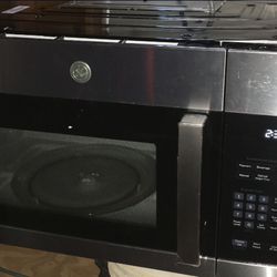 NEW GE stainless steel over the stove microwave 