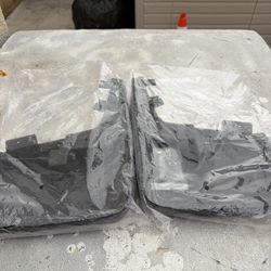 The 2015 Ford F-150 mud flaps.  