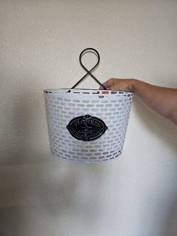 Cute black & white flower pot holder.