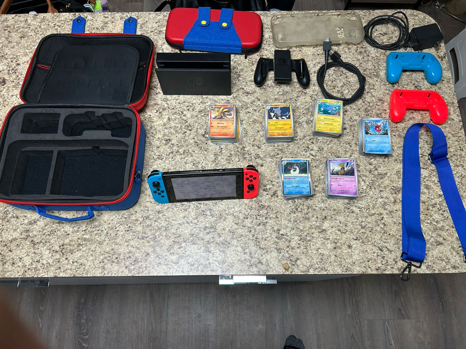 Nintendo Switch For Sale With Games, Pokemon Cards And Super Mario Case