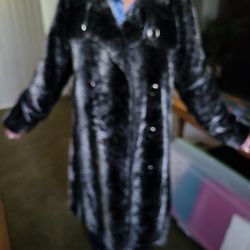 Large fake mink coat, perfect new never use black with silver in https://offerup.com/redirect/?o=aXQuQXQ= three hundred dollars