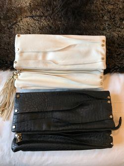 2 Izzy & Ali clutch bags