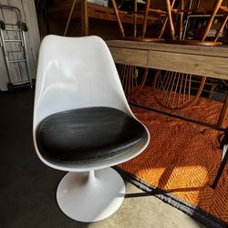 White tulip chair with leather seating pad