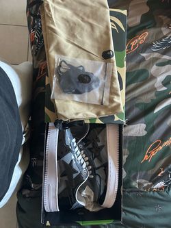 Black and gray bathing ape (bape) shoes