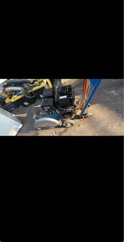 Concrete and tile cutter with predator engine