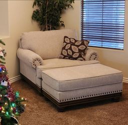 2 large chairs and ottomans