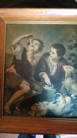 Renaissance photo of two children in a dog having a picnic