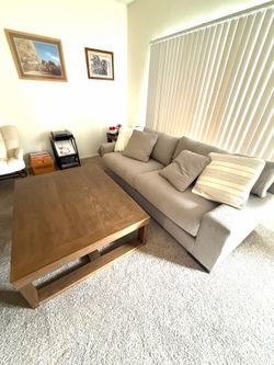 Sofa and coffee table it’s from Ashley’s