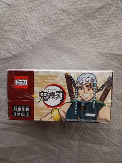 Dream Tomica model car based on Tengen Uzui from Demon Slayer: Kimetsu no Yaiba.