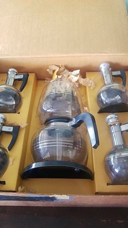 Antique vacuum coffee pot and carafettes