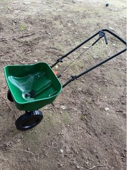 NEW - Turf Builder EdgeGuard Mini Push Broadcast Spreader