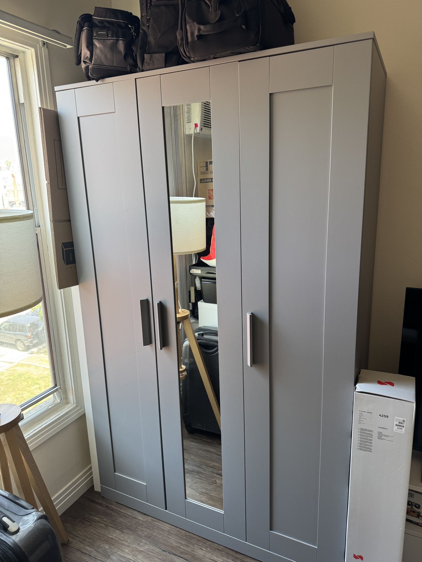 Sleek IKEA Wardrobe with Mirror