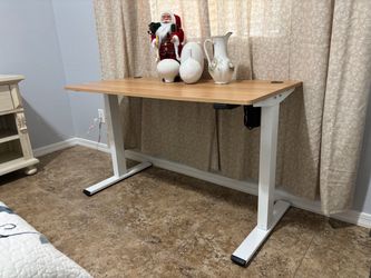 Electric height-adjustable desk
