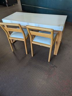Modern white desk with chairs