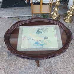 REALLY NEAT LOOKING ANTIQUE SMALL TABLE  THIS HAS SOME SCRATCHES  AND also Has A GLASS TOP  