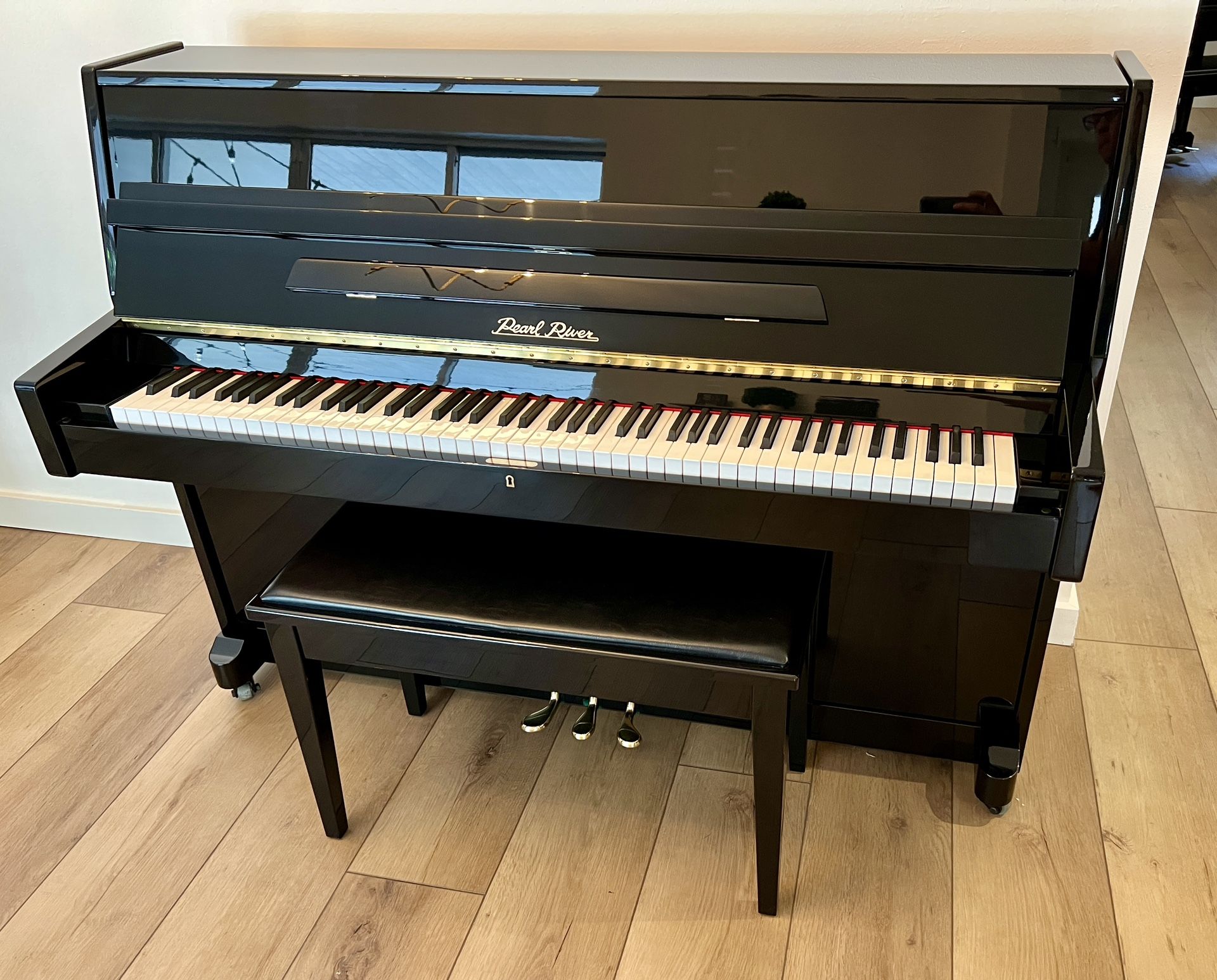 Like New Shiny Black Pearl River Piano