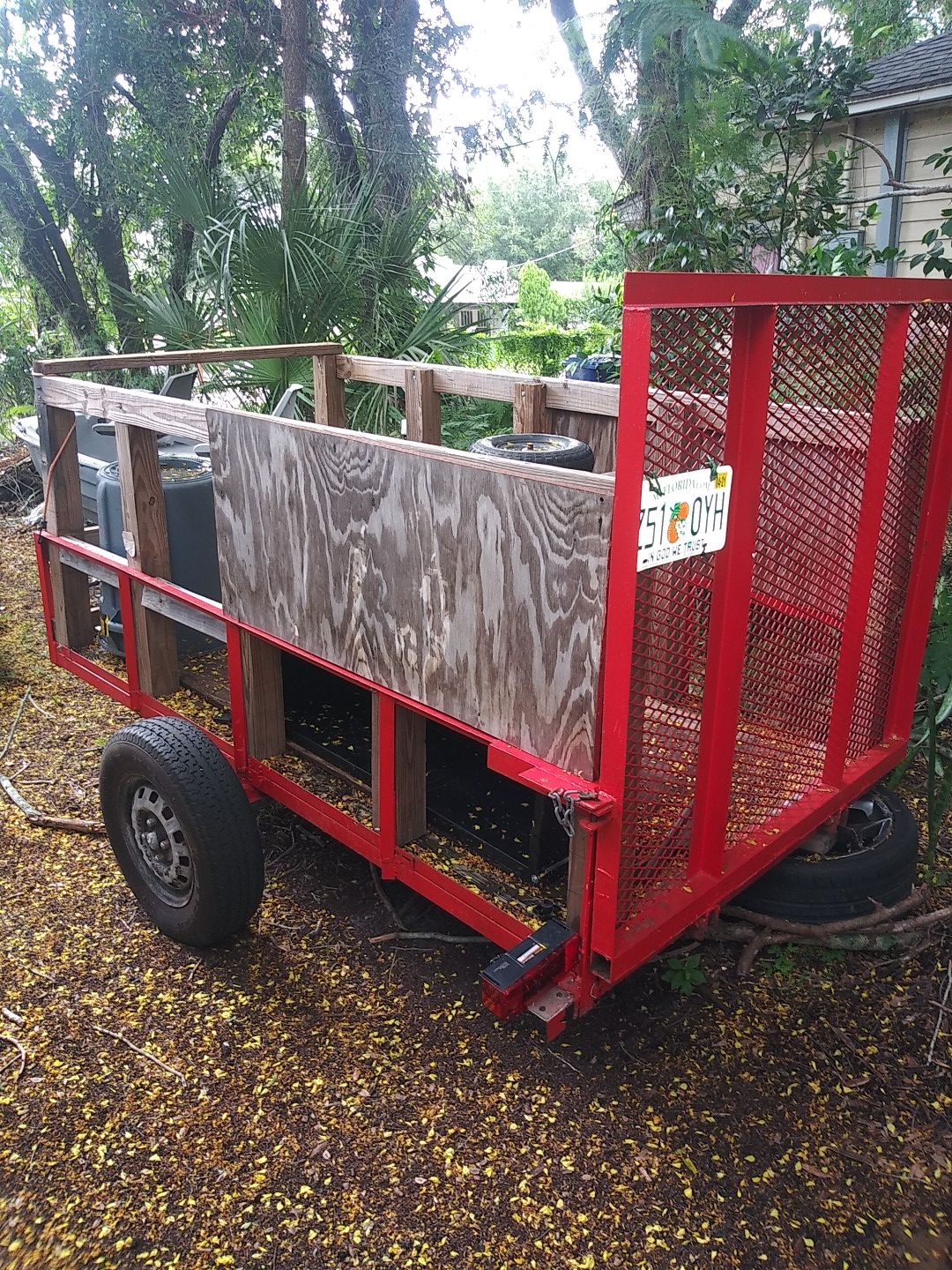 Trailer. With papers and caged ramp