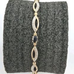 Vintage 925 DL golden stone tennis bracelet  In good condition  8.83 grams  Approx 7.75 inches in length 