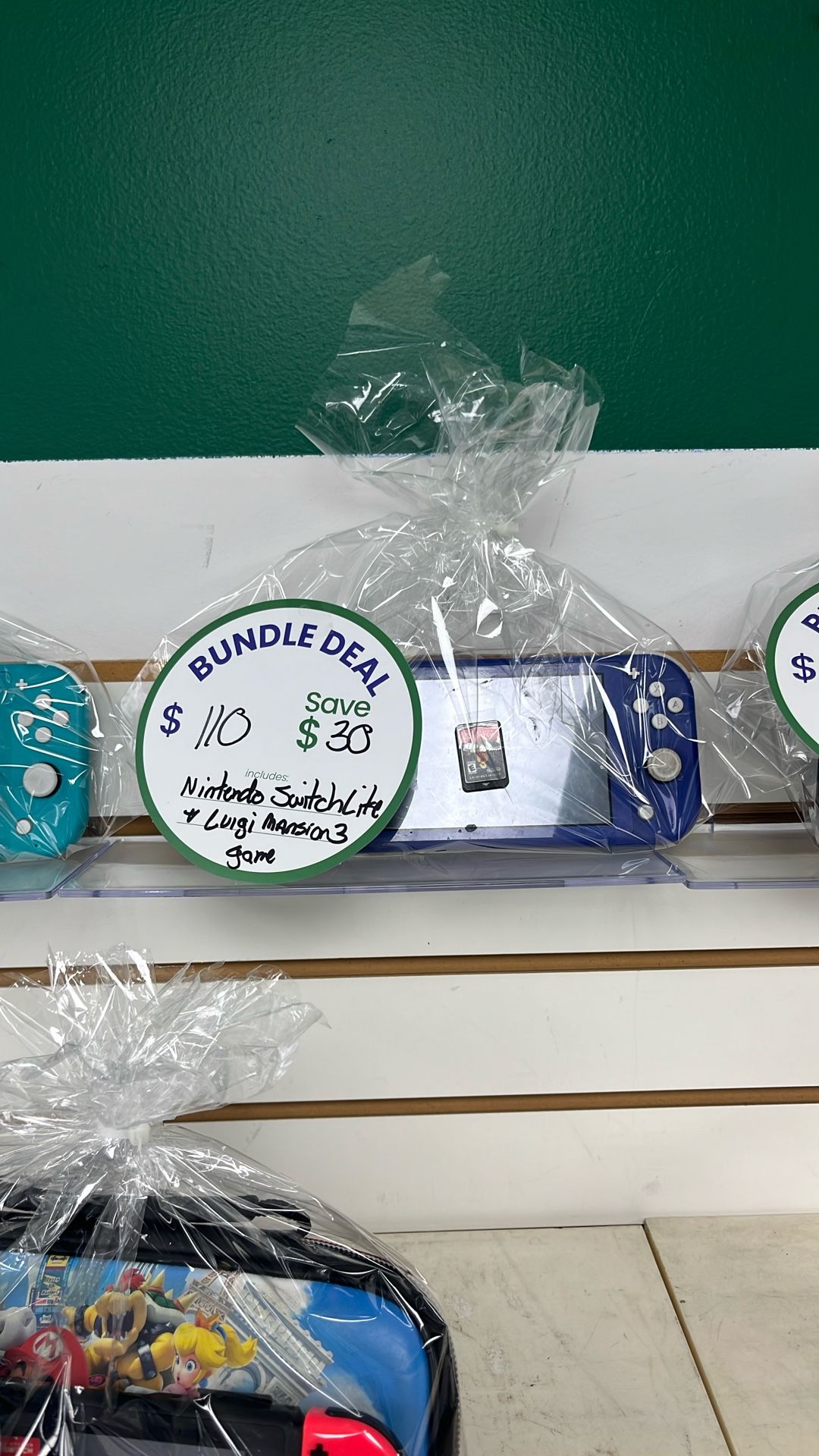 Nintendo Switch Lite With Luigi Mansion 3 Game