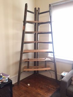 Vintage wooden ladder shelving system