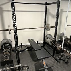 Over 700lbs of Olympic free weights! Complete Home Gym