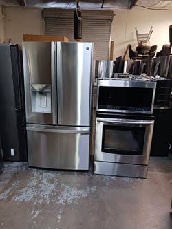 Refrigerator Kenmore French Door- stove Electric and microwave in stainless steel Combo Delevery