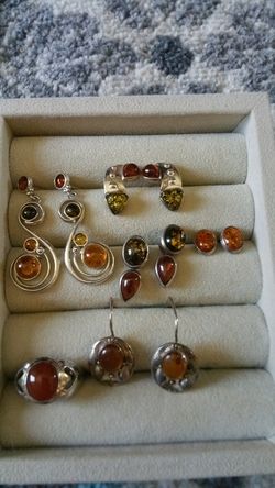 Amber sterling silver pendant, bracelet and amber earrings.