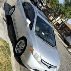 2006 Honda Civic EX  1.8 L Gas Saver  Read Full Description 