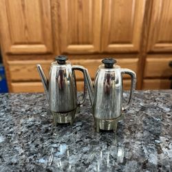 Vintage Coffee Percolator Plastic Pair of Salt Pepper Shakers.  Size approximately 3 inches tall.  Preowned.  
