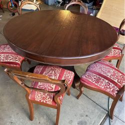 Antique Table On Chairs 