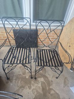 Best Offer 4 heavy wrought Iron chairs and table base. (Not original wood table top)