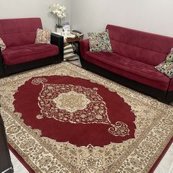 Red Couch's and Red rug with it
