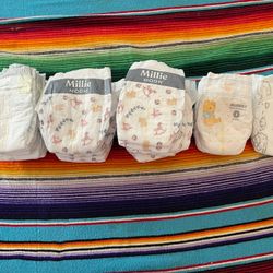 Diapers Size 1, 23 total, Assorted: Millie moon, Pampers, Huggies