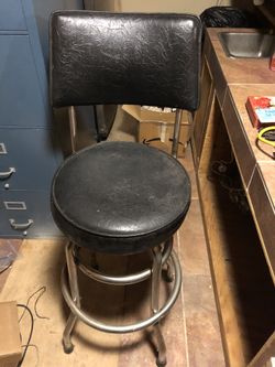 Black swivel bar chair