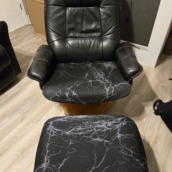 Swivel Black Leather Recliner and Ottoman