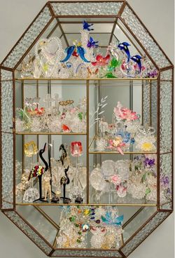 Glass Figurine Collection in Display Cabinet