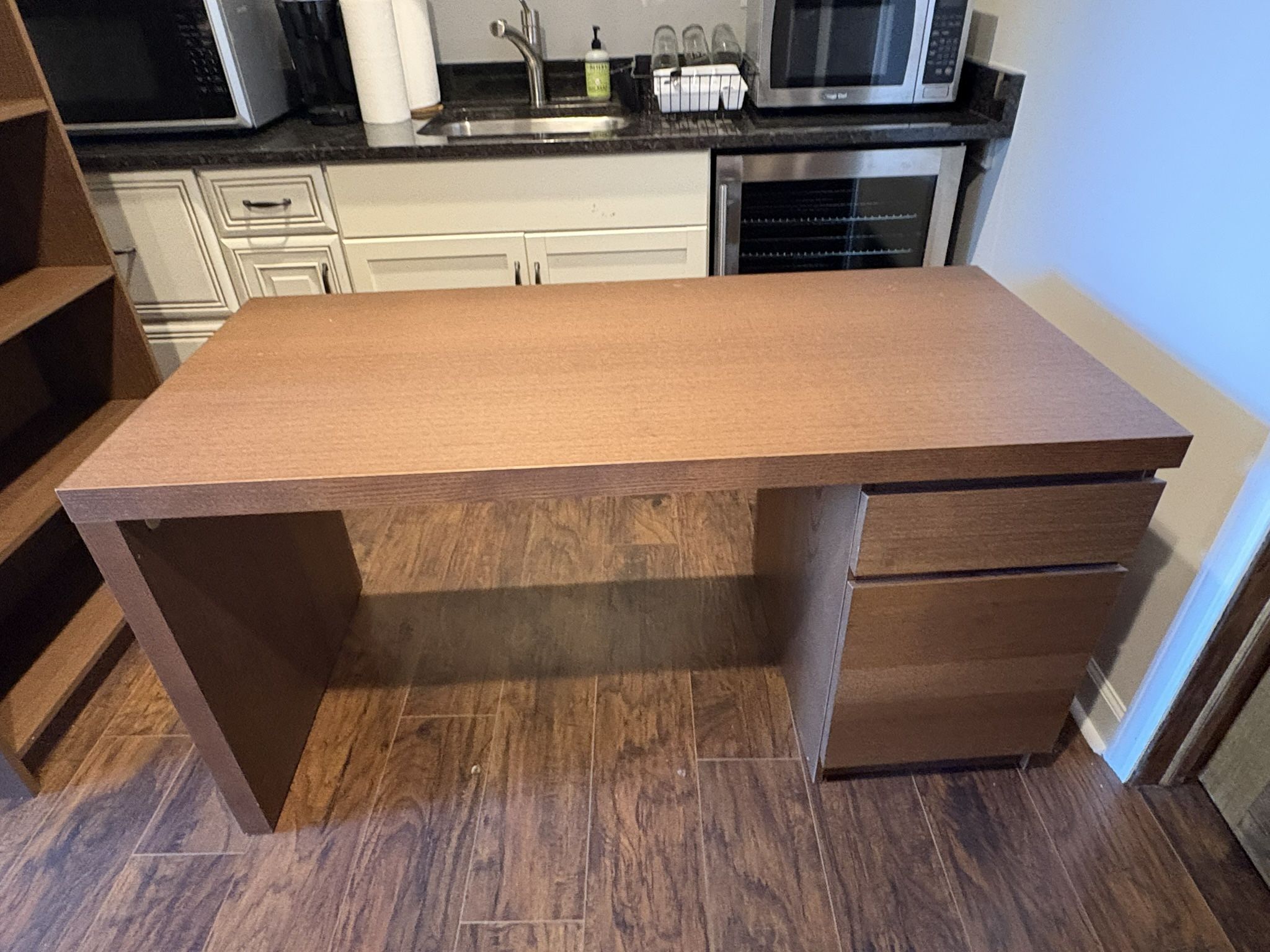 2- Wood desks and a bookshelf