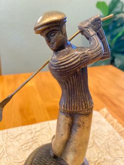 Metal  bronze statue of golfer. 9 inch tall. Vintage early 1900 s style. Heavy.