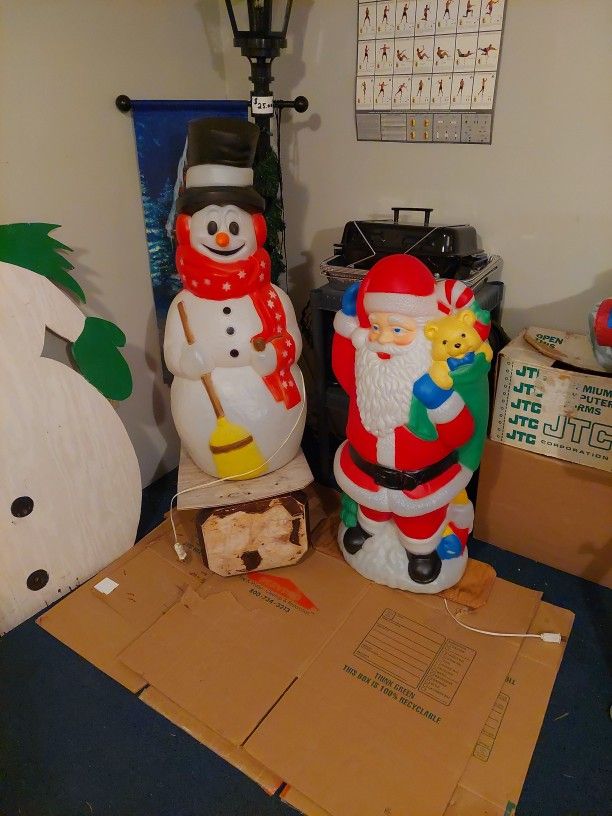 Christmas decorations outside plastic snowman santa claus