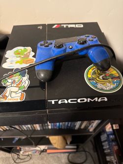 Sony PlayStation 4 Console with Blue DualShock Controller