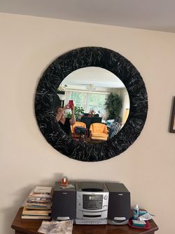 Black large round mirror