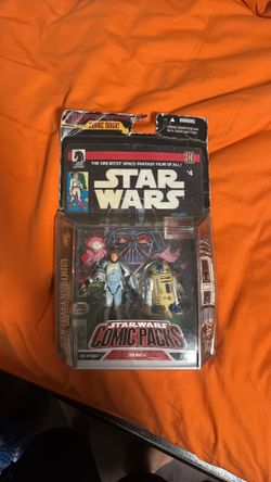 Star Wars action figure and comic book included vintage collectible