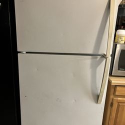 Refrigerator/ Needs To Be Cleaned