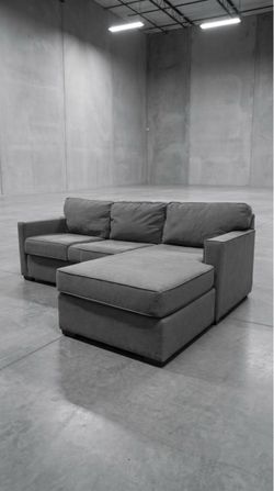 Living Spaces Charcoal Grey Reversible Sectional